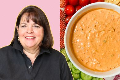 Ina Garten alongside a bowl of dip and a variety of vegetables