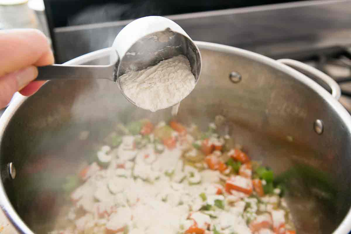 Flour added to soup to make Chicken and Dumplings soup.