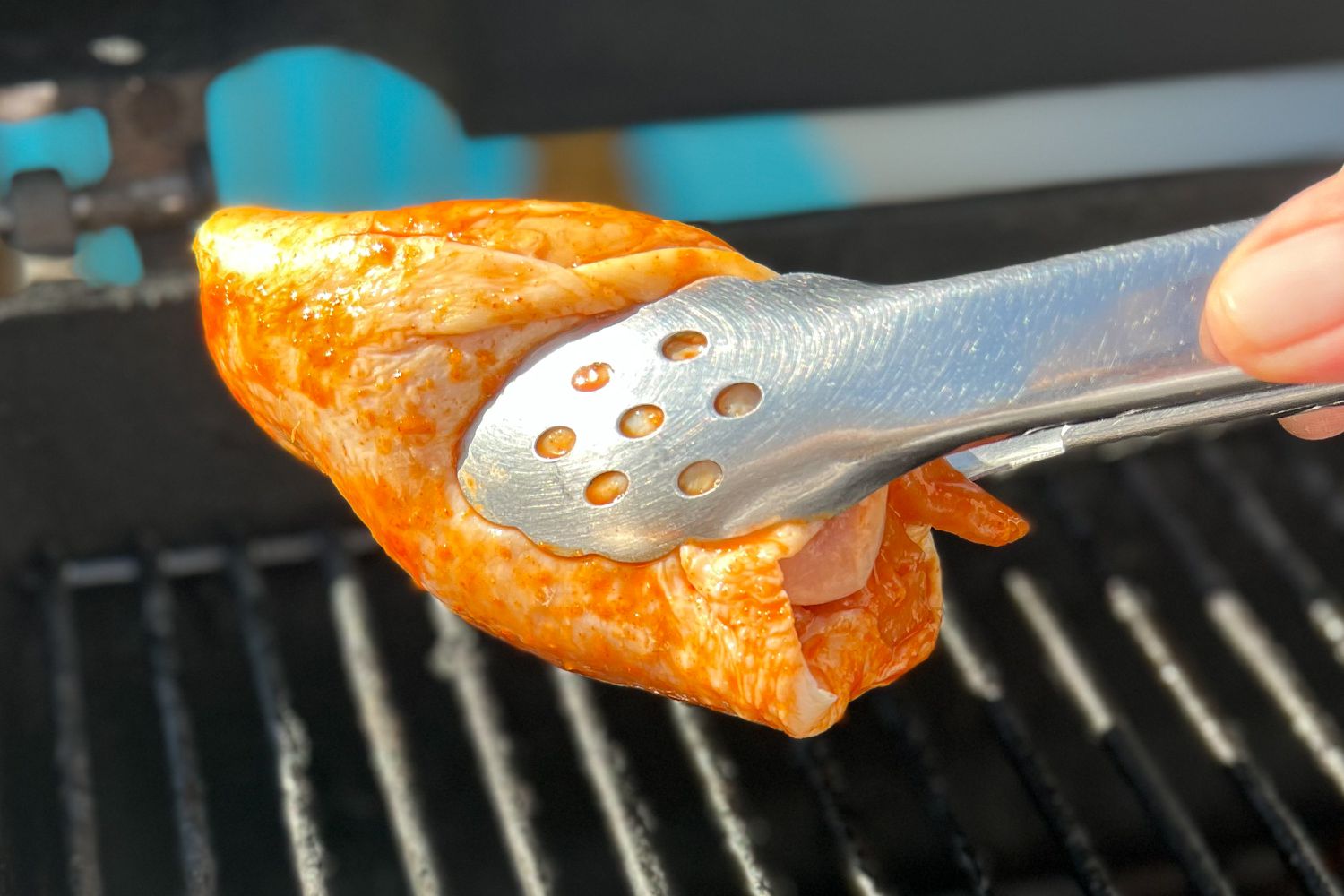 Tongs and Grill for Easy Grilled Gochujang Chicken Thighs