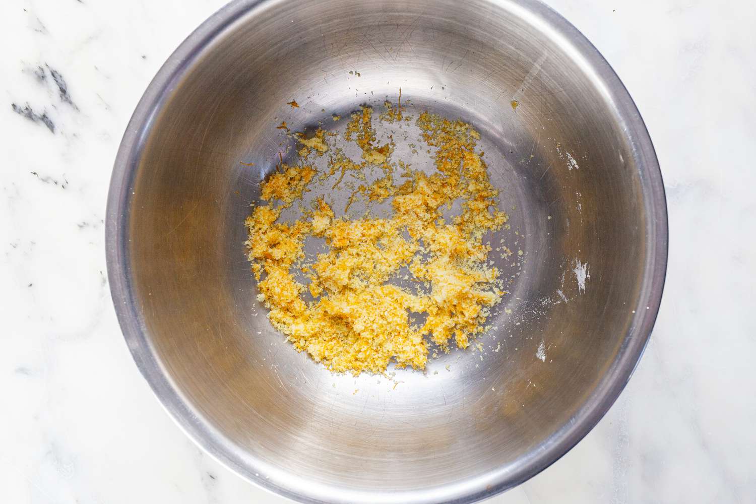 Rub citrus zest with sugar.