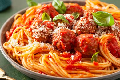 large plate of spaghetti with meatballs