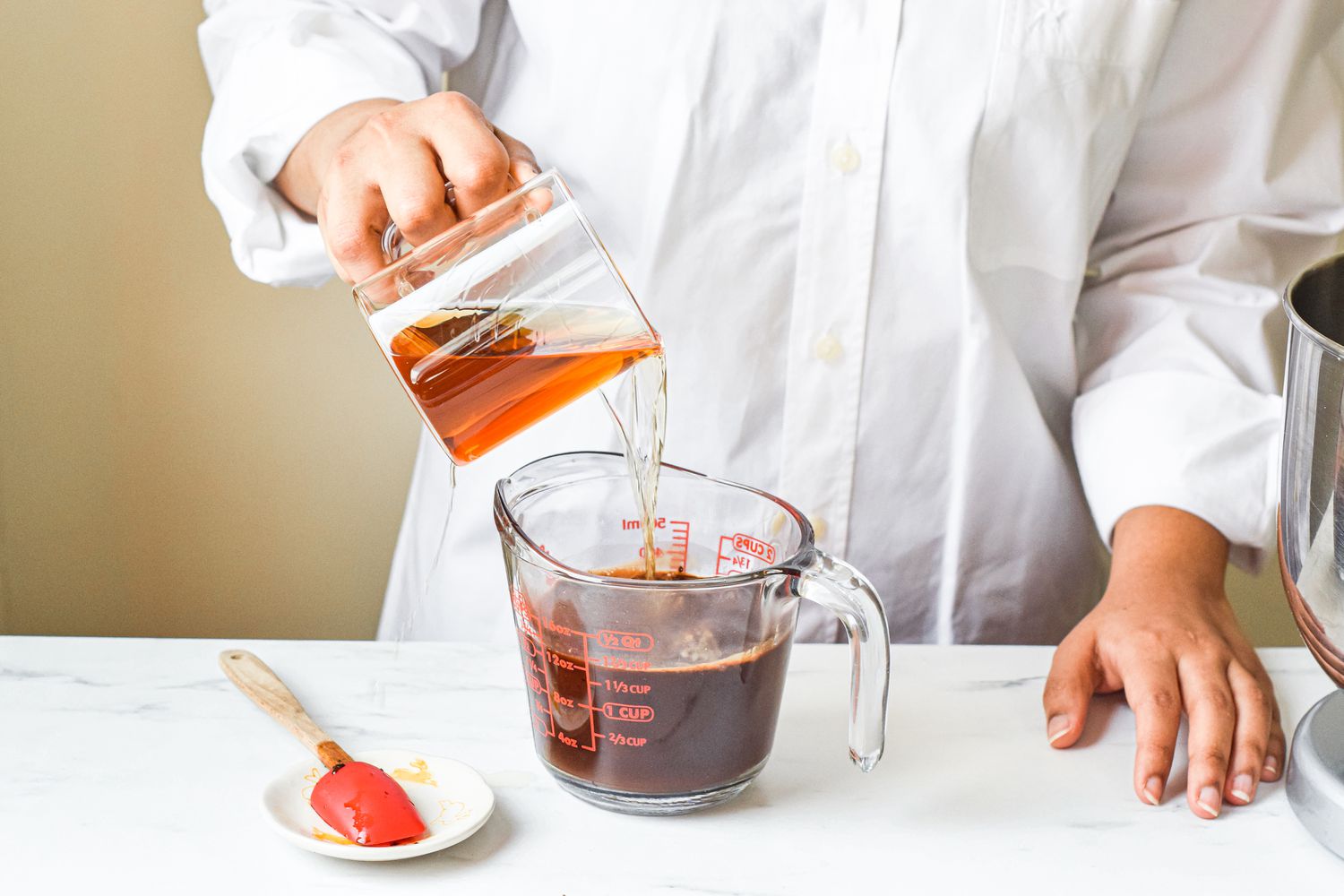 Measuring out whisky for a Chocolate Bundt Cake recipe