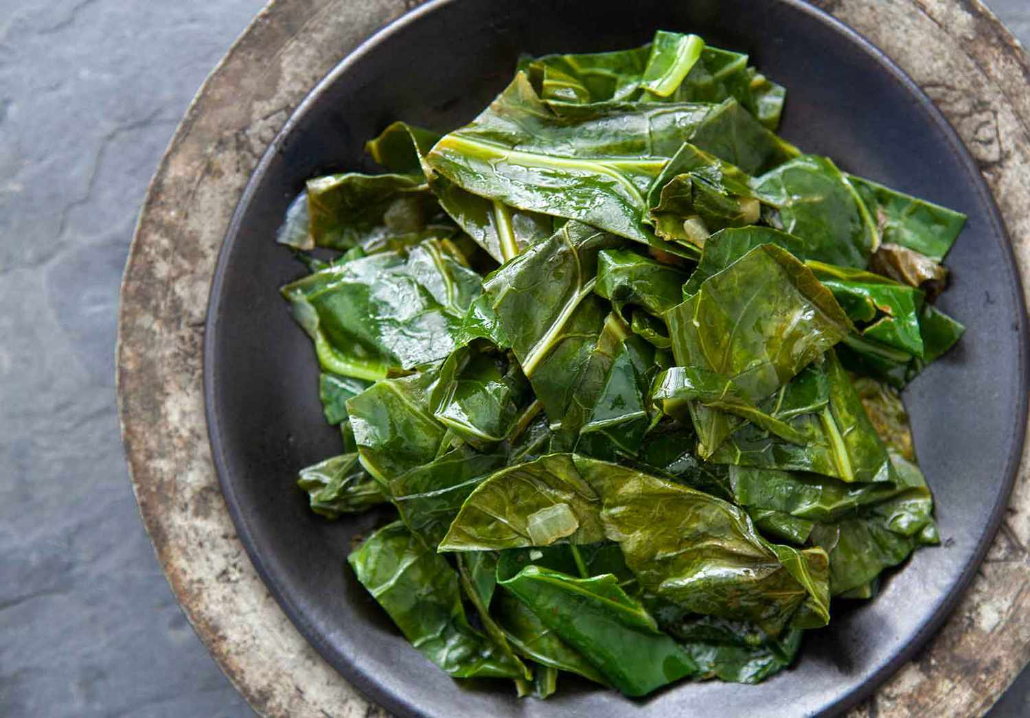 Best ever collard greens cooked on the stovetop and served in a bowl