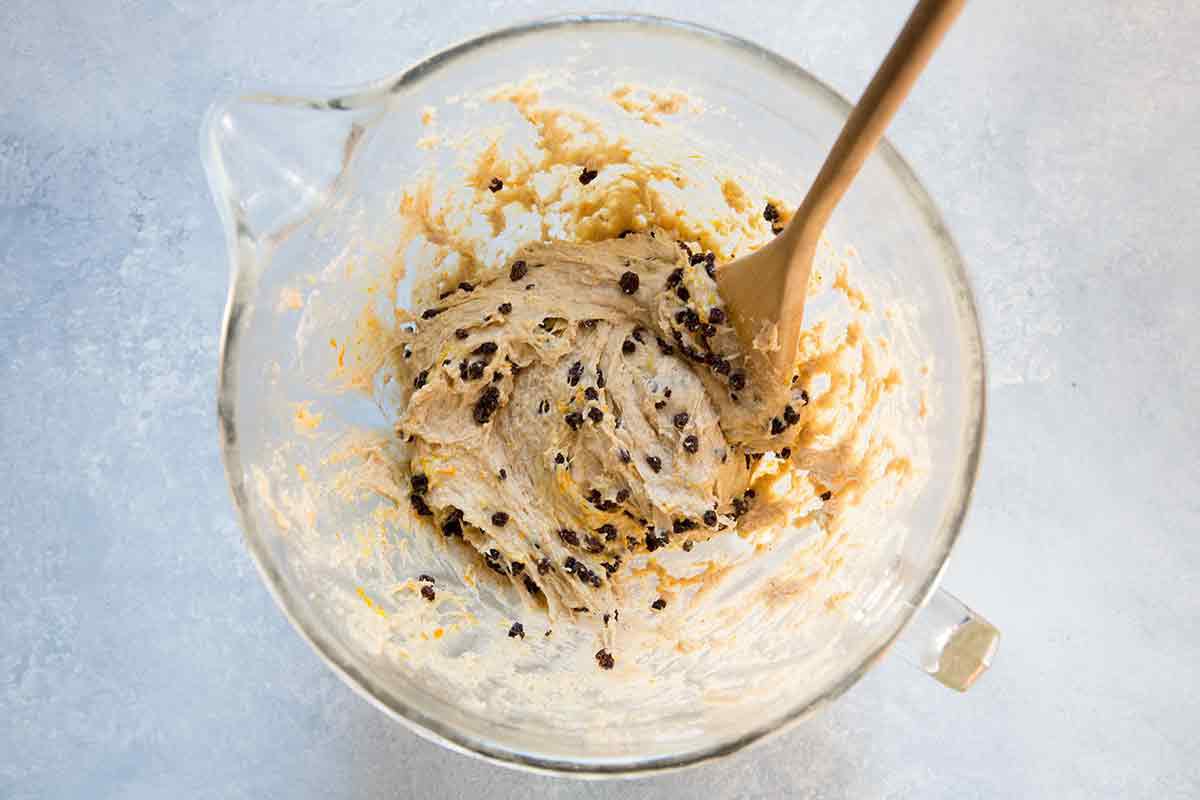 Hot cross bun dough after the currents and orange peel have been mixed in
