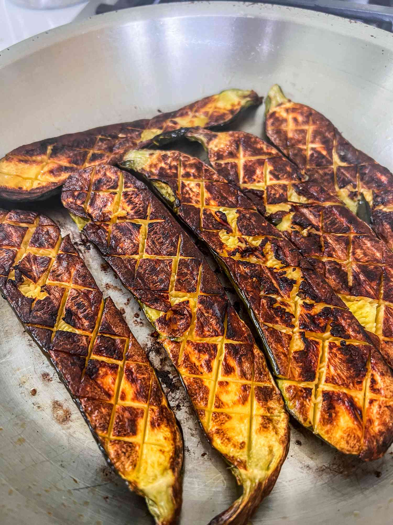Over roasted zucchini in skillet