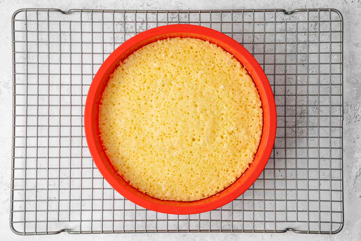 Baking Pan Cooling on a Wire Rack for Microwaved Cake Recipe