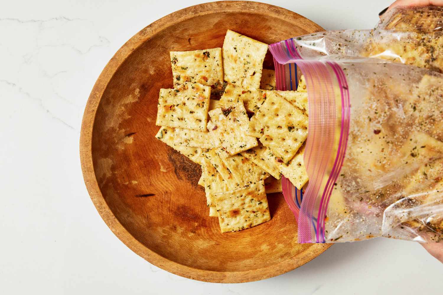 Alabama crackers poured into a bowl from the ziploc bag