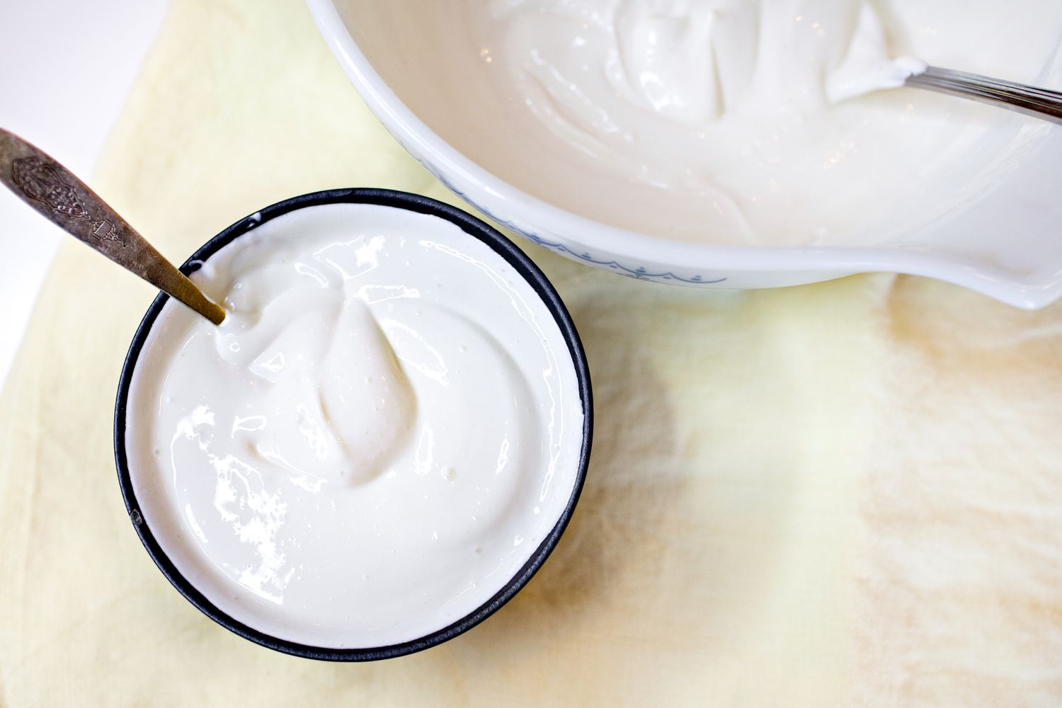 homemade greek yogurt in a bowl with a spoon