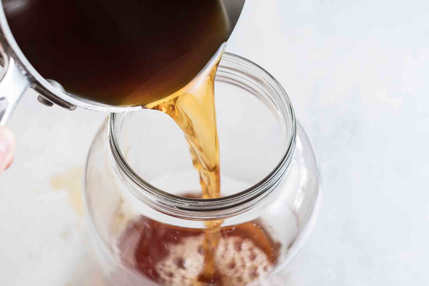 Pour the cooled sweet tea into a large jar to make homemade kombucha