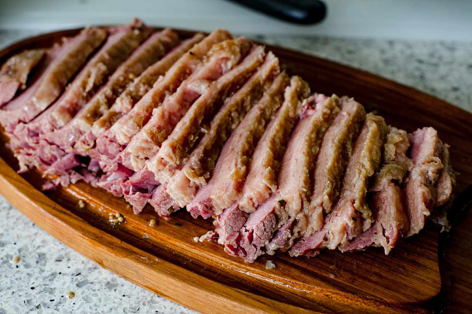 Instant Pot Corned Beef - sliced corned beef on platter
