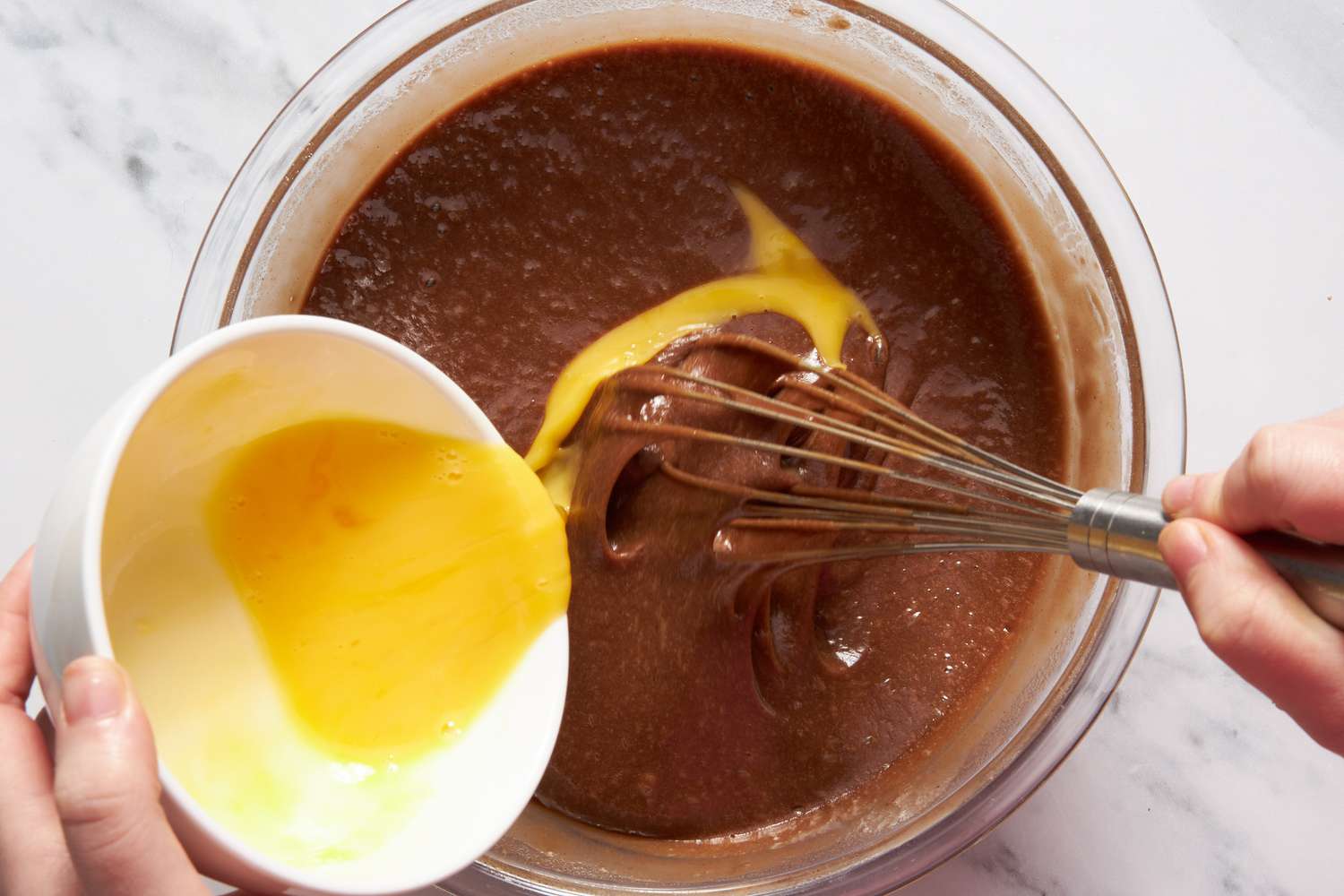 Eggs whisked into the Dr. Pepper cake batter