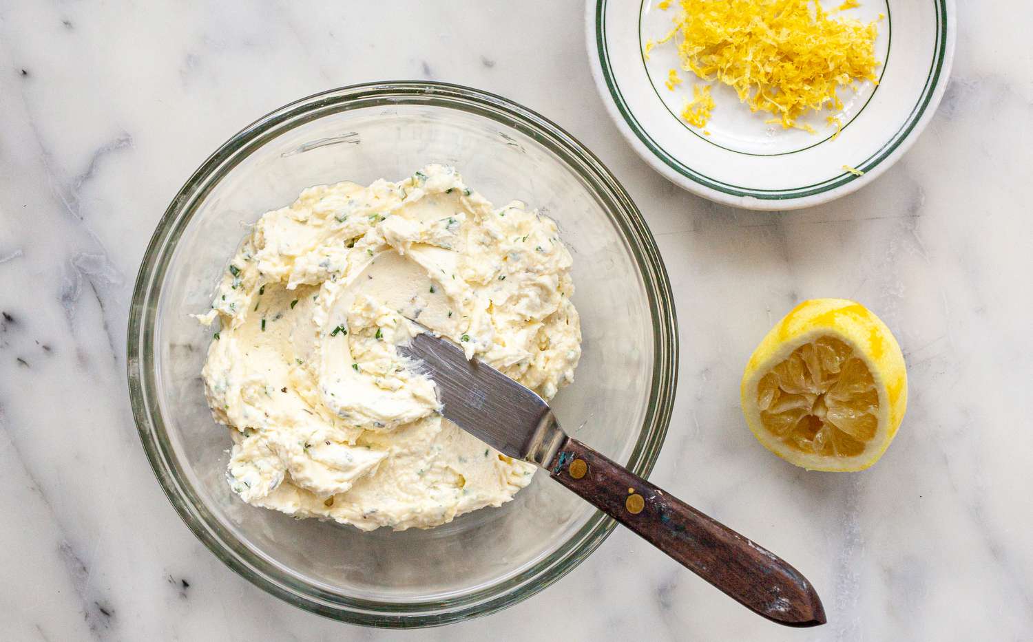 Lemon added to goat cheese to make an Asparagus Puff Pastry Tart.