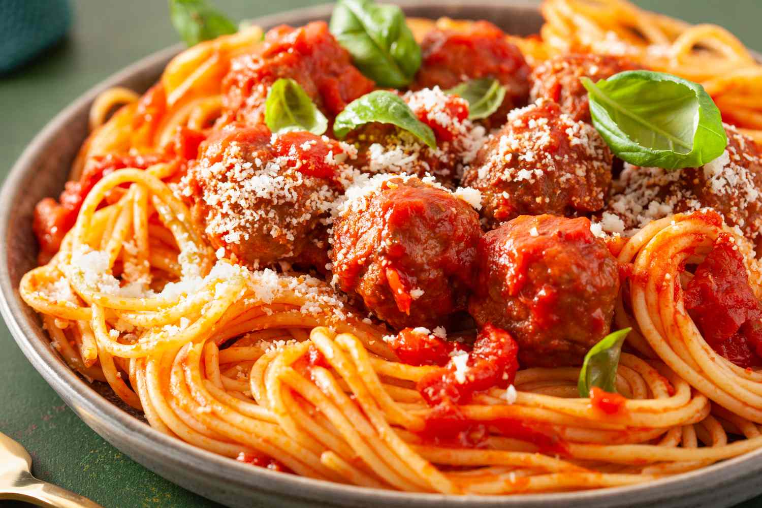large plate of spaghetti with meatballs
