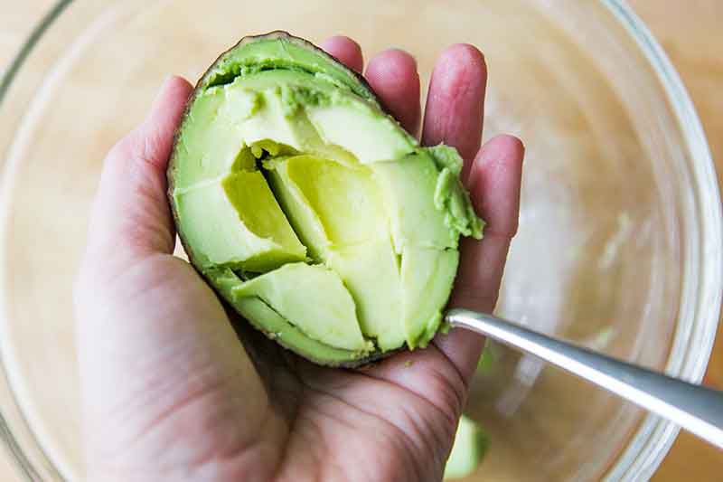 How to make guacamole - scoring avocado