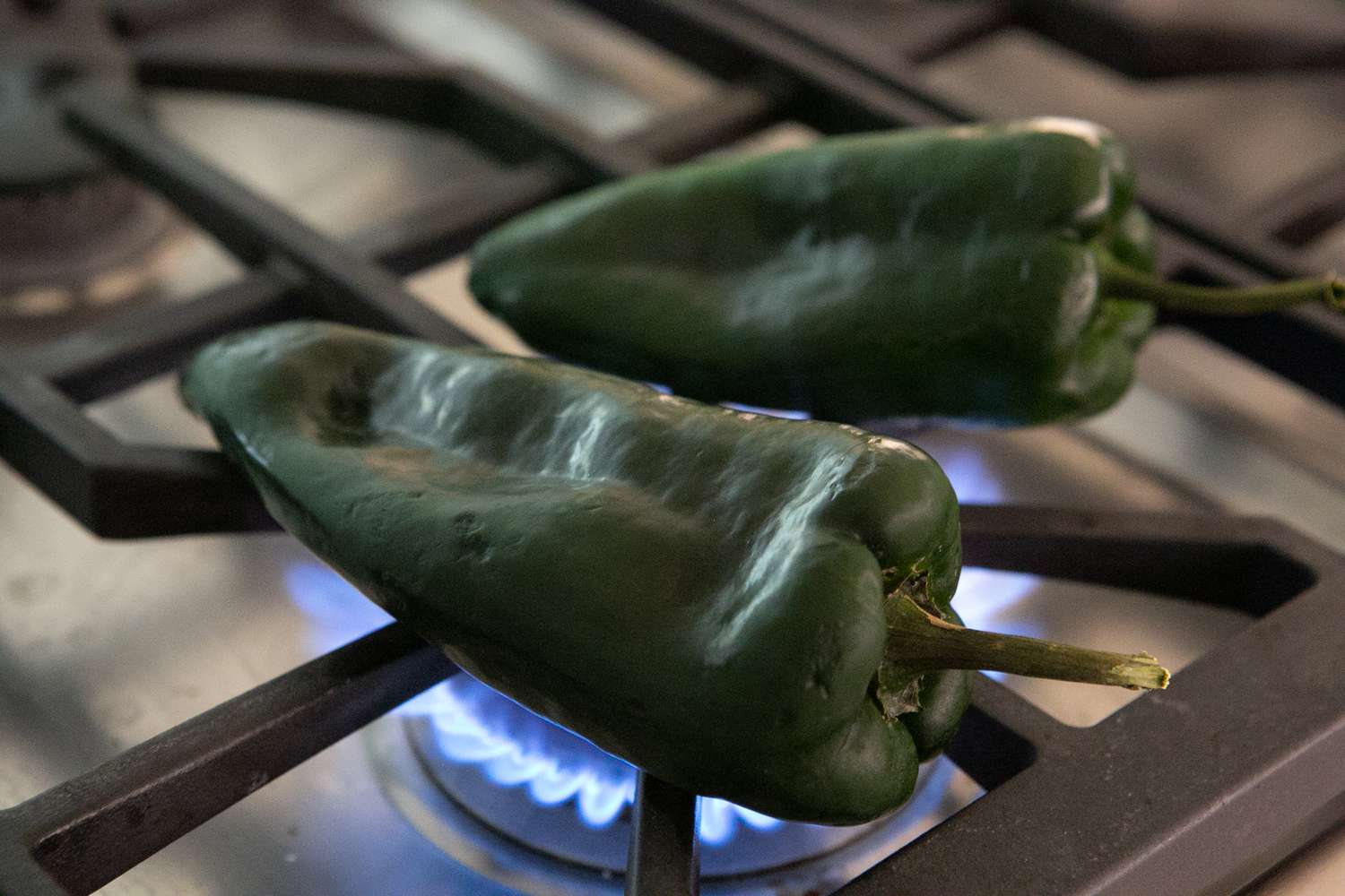 Poblano Peppers on Roasting on Stove for Chile en Nogada