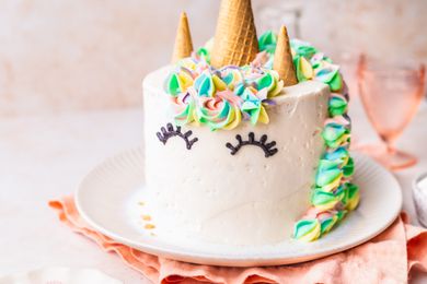 Unicorn Cake on Plate with Kitchen Towel Under the Plate