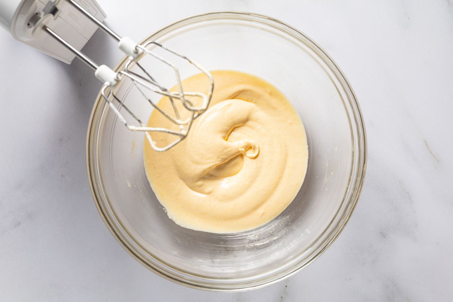 egg yoke and flour mixture mixed together for magic cake (gÃ¢teau magique) recipe 