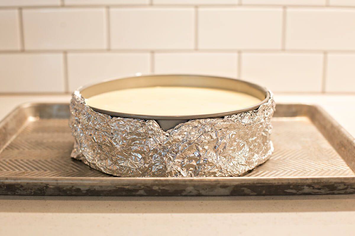 Cheesecake Recipe with Lemon - foil wrapped springform pan with cheesecake