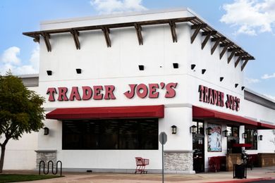 Exterior of a Trader Joe's store with visible signs and entrance