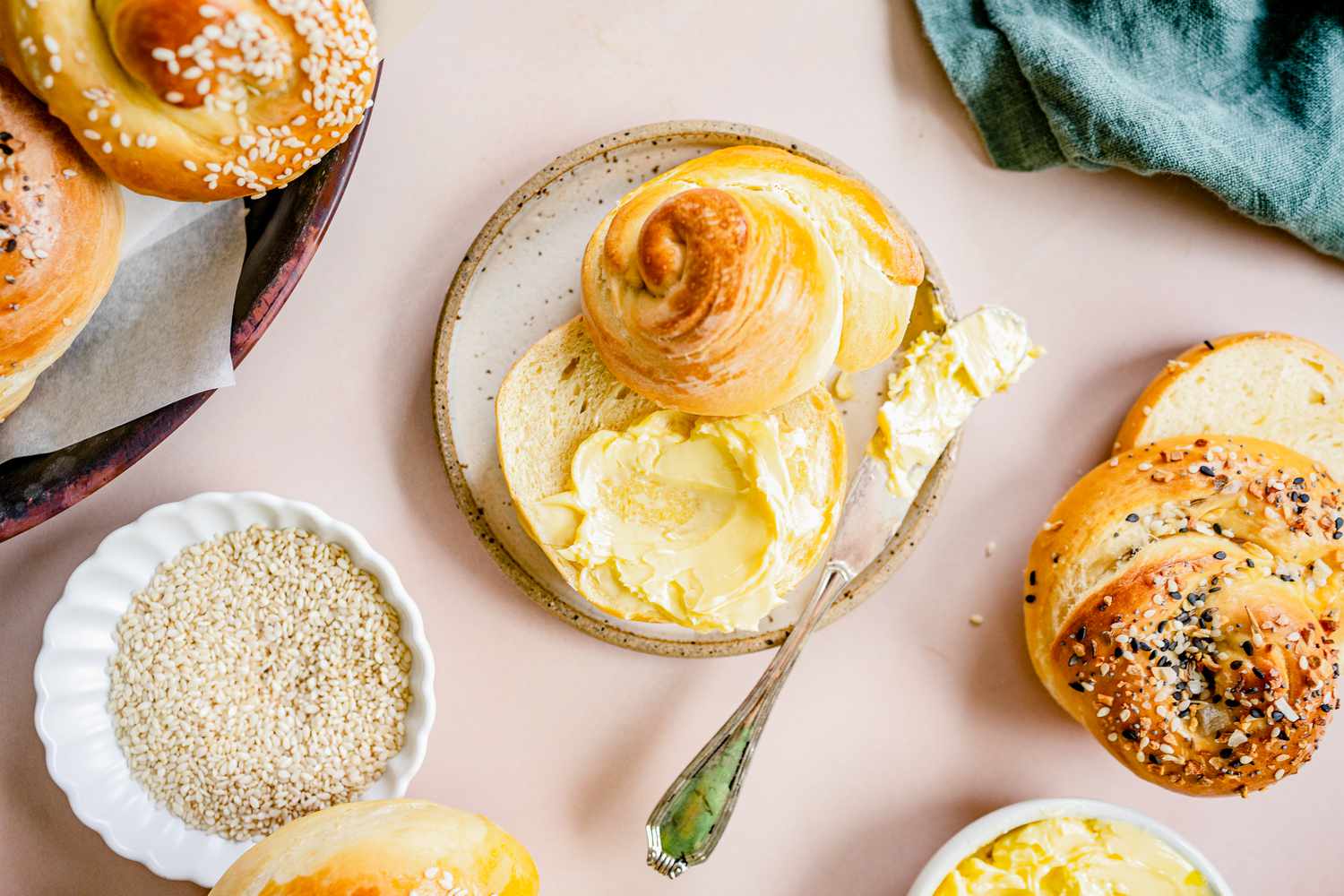 Challah Roll Cut in Half and Smeared with Butter