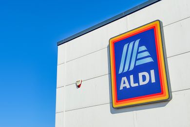 An ALDI sign on a wall of an ALDI store