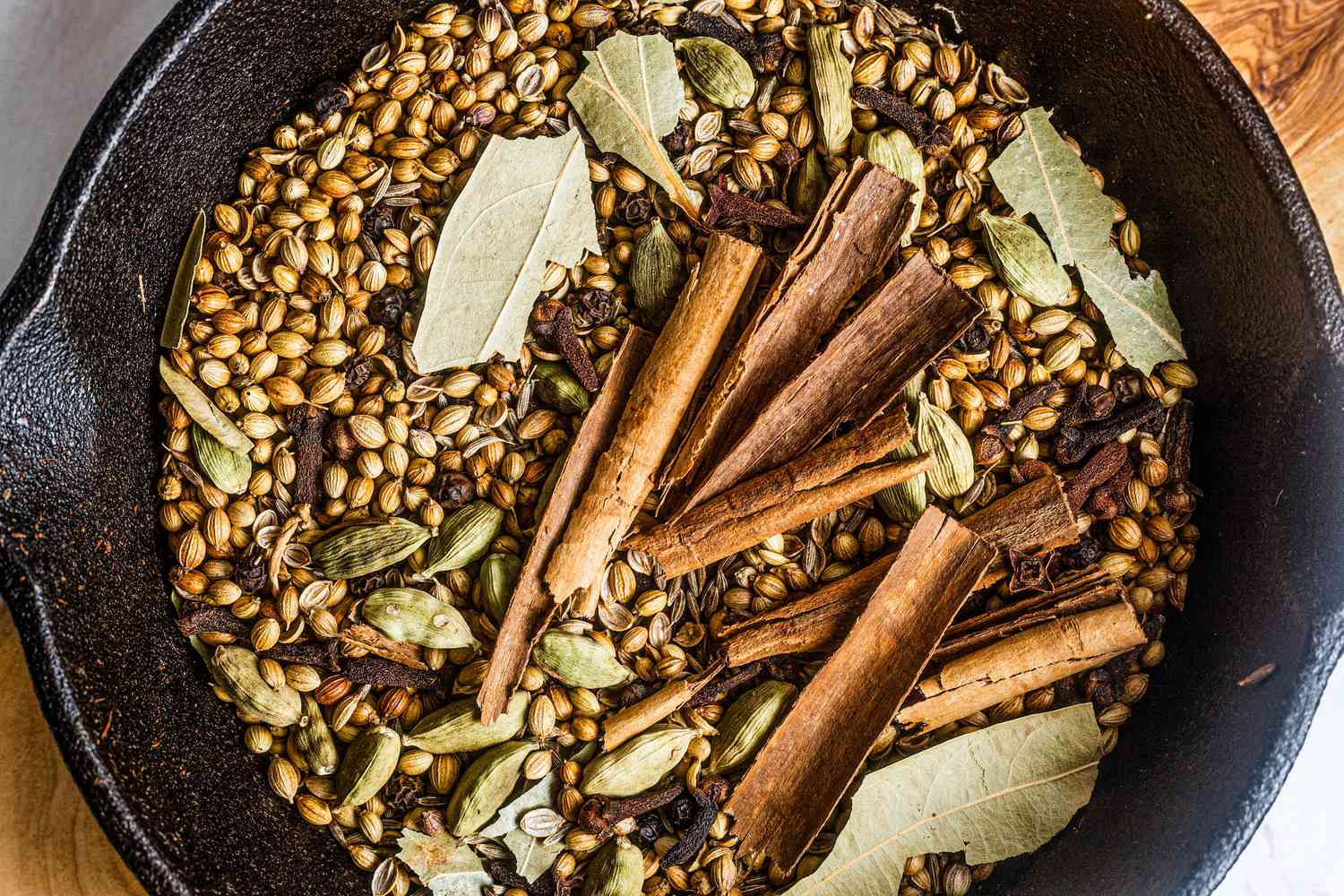 Whole Spices in a Cast Iron Skillet