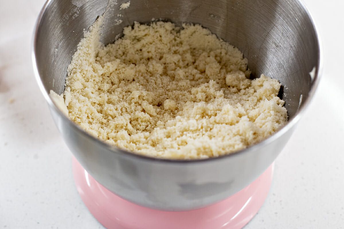 Crumbly butter and flour mixture in a bowl