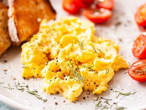 Easy Scrambled Eggs with toast on a plate