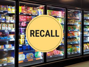 Supermarket freezer section with a yellow circle and the word RECALL overlaid