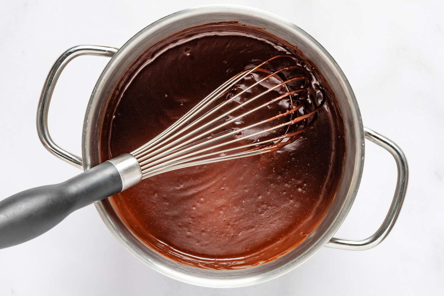 chocolate whisked into butter-coffee mixture for devil's food cake recipe