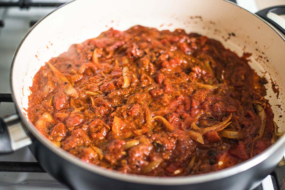 Chicken Tikka Masala Recipe Add the tomatoes to the masala sauce on stovetop