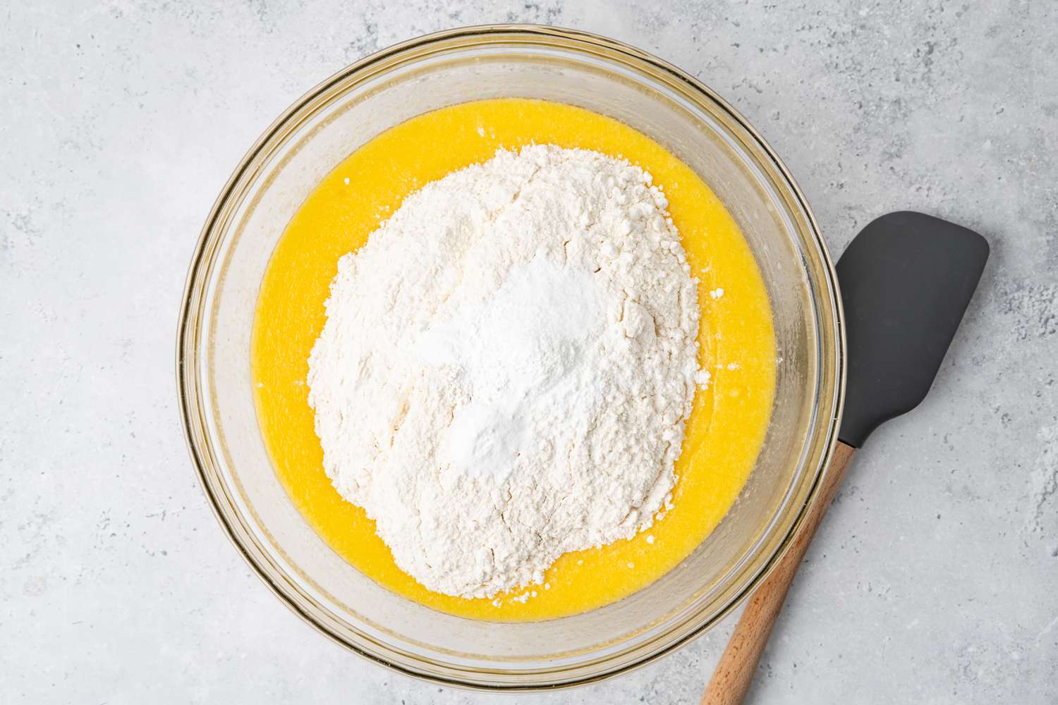 Dry Ingredients Added to Bowl of Wet Ingredients for 3-Layer Cake In the Microwave Recipe