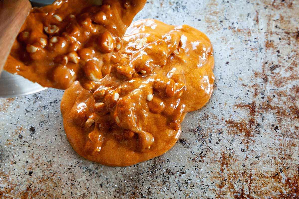 Old Fashioned Peanut Brittle Recipe spread out the brittle