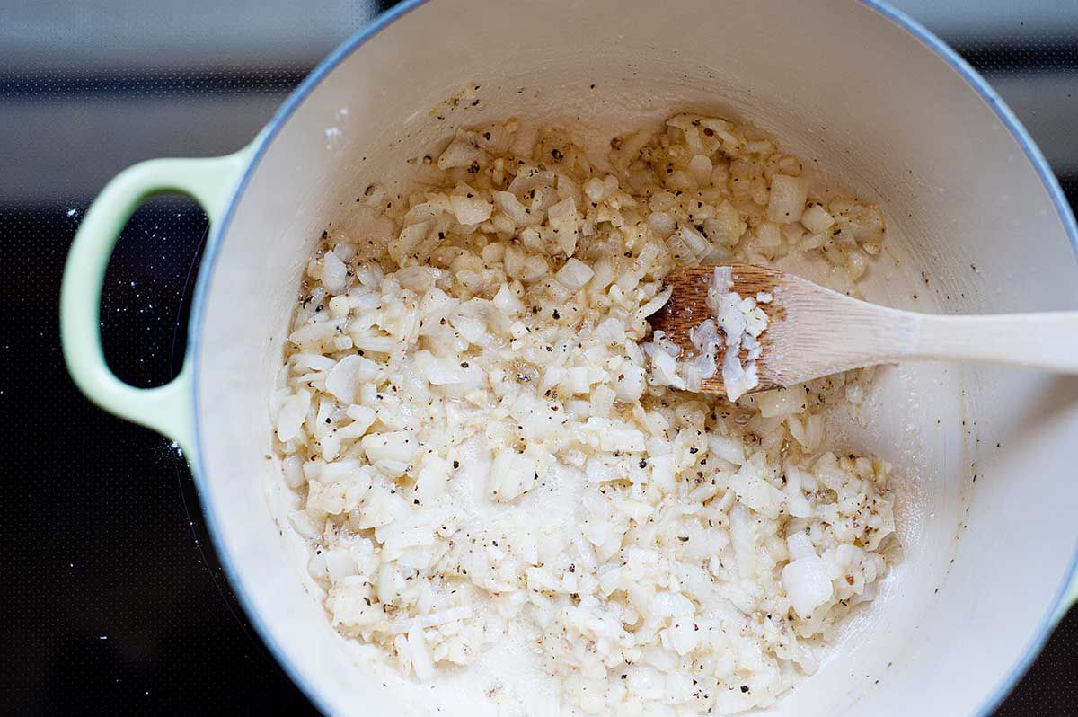 How to Make Tomato Soup - flour and fat in the bottom of a soup pot wtih onions