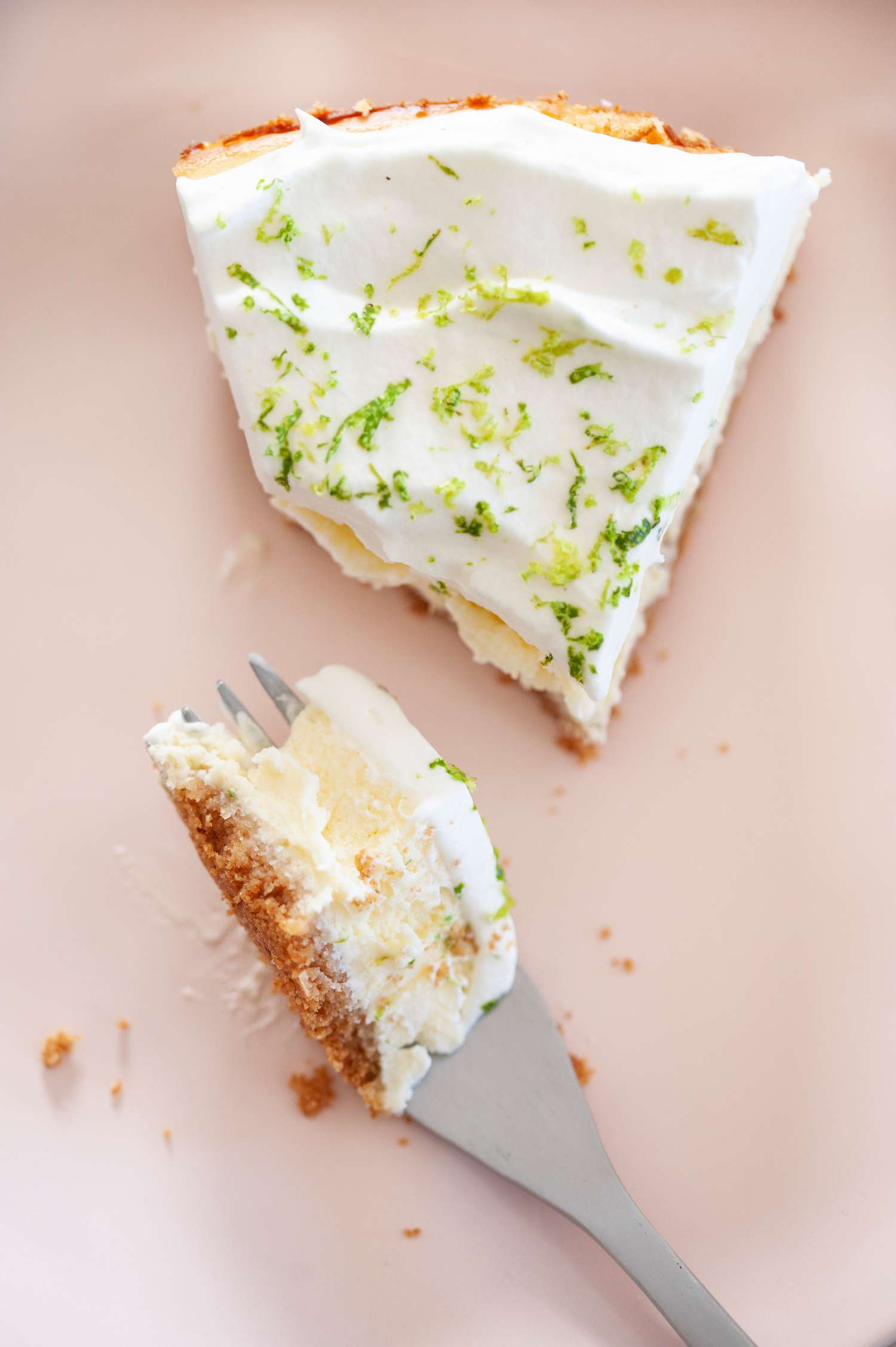 A bite of key lime cheesecake.
