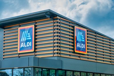 Exterior view of a modern Aldi store with prominent signage