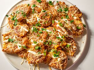 Crispy Caesar Smashed Potatoes on a platter