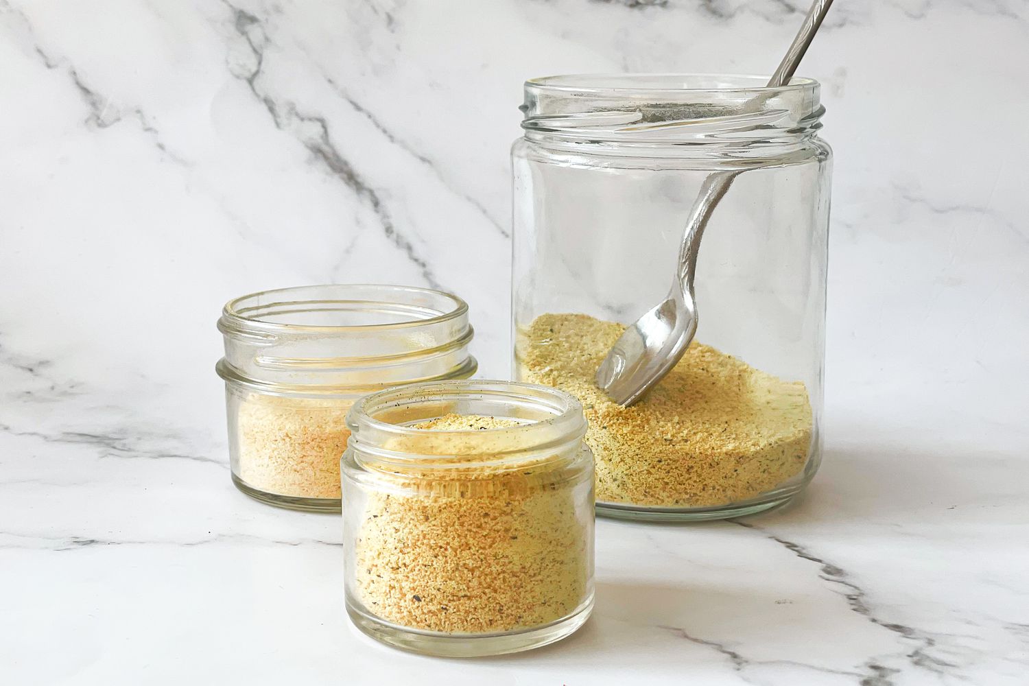 Homemade adobo seasoning in clear jar