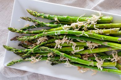 Oven baked asparagus on a platter.