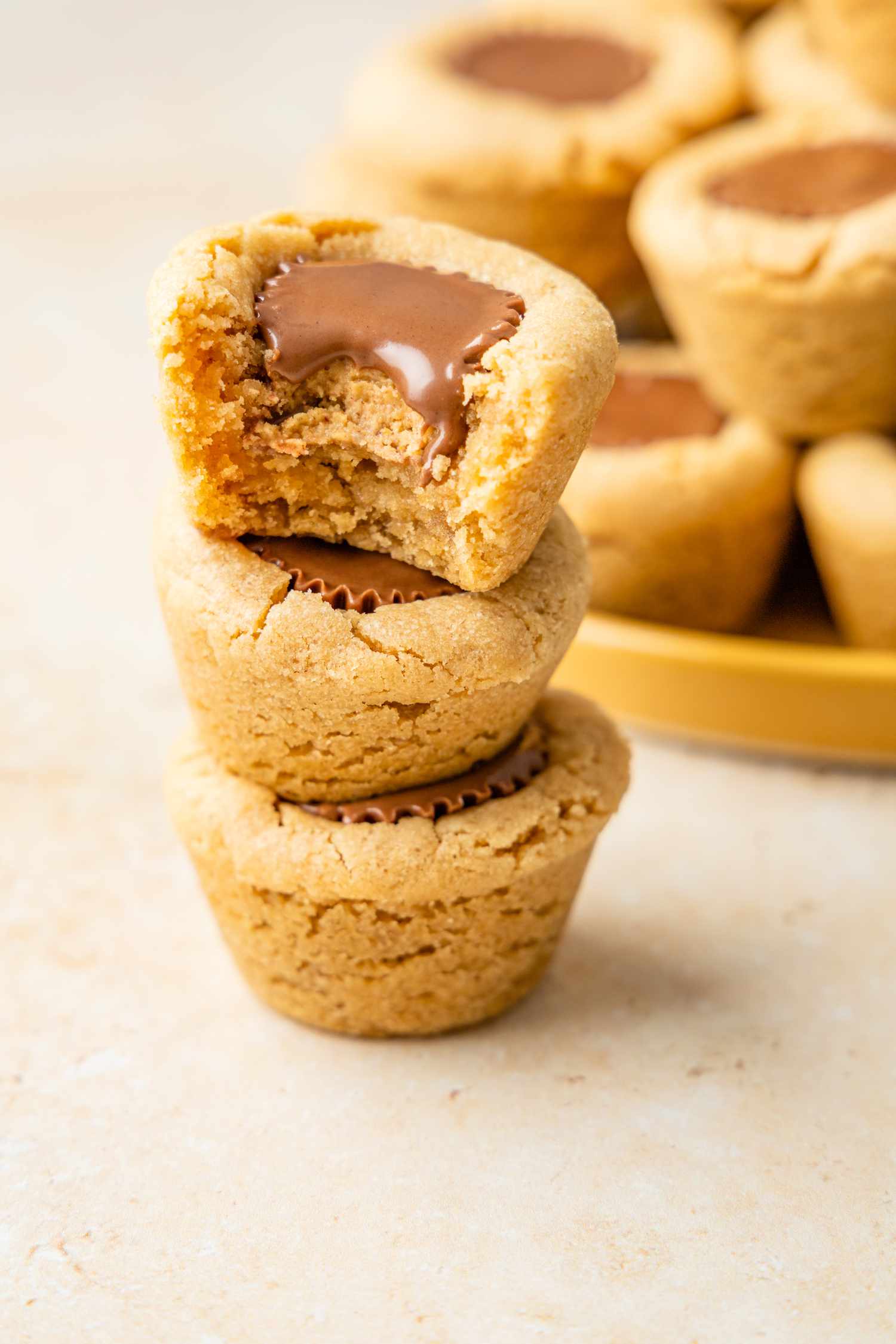 Stack of Peanut Butter Cup Cookies with the Top One Bitten Into