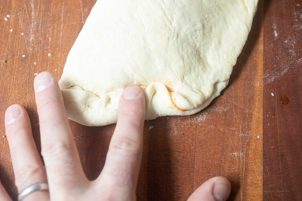 Sealing a Pepperoni Calzone 