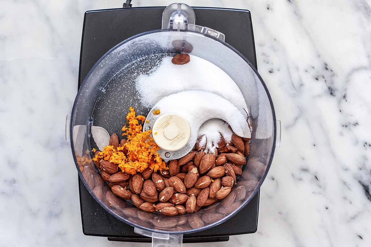 Almond Flour Cake with Rhubarb -- almonds, sugar and orange zest in food processor