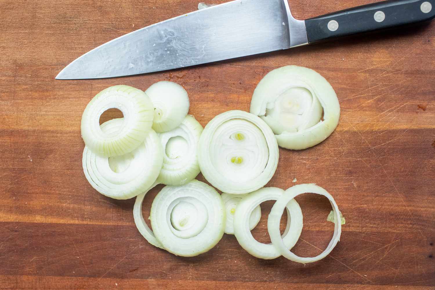 Onions sliced to make the Best Air Fryer Onion Rings.