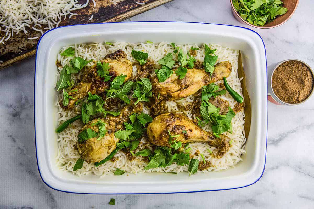 Easy Chicken Biryani add the chicken, yogurt, mint and cilantro