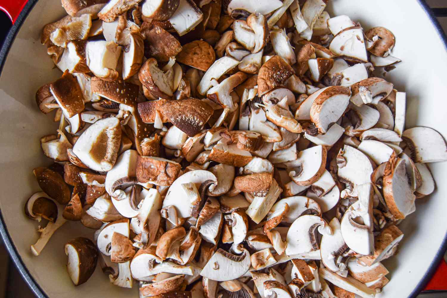 Chopped mushrooms in a Dutch oven