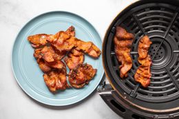 Air Fryer Bacon on Plate and in Air Fryer