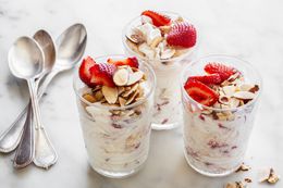 Glasses of Strawberry Eton Mess with Spoons