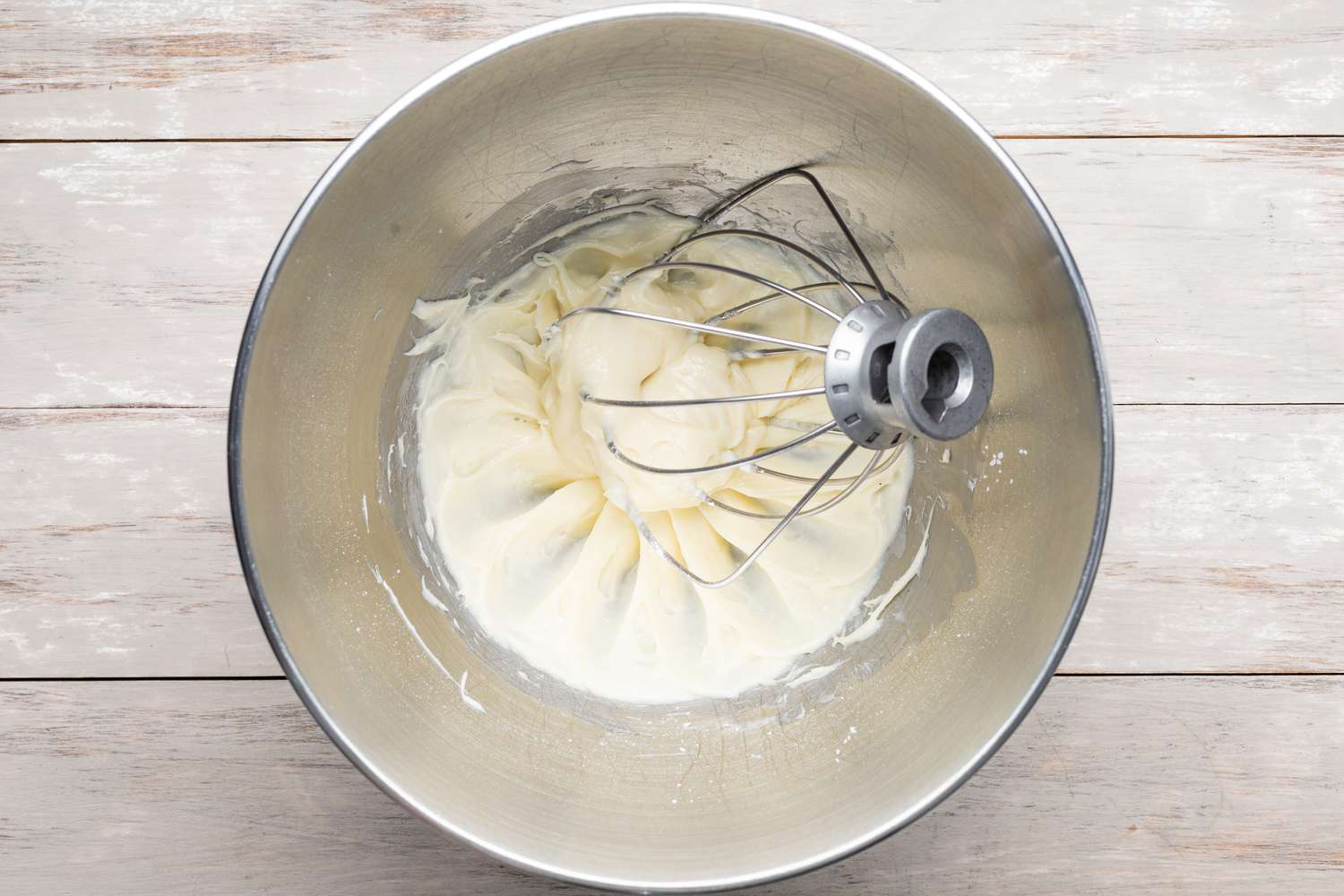 Cream Cheese and Powdered Sugar in Whisked Together a Mixer Bowl Using the Whisk Attachment