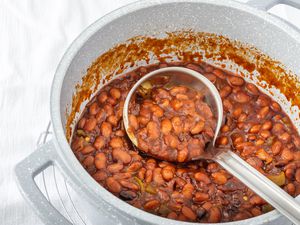 Overhead view of a pot of cowboy baked beans.