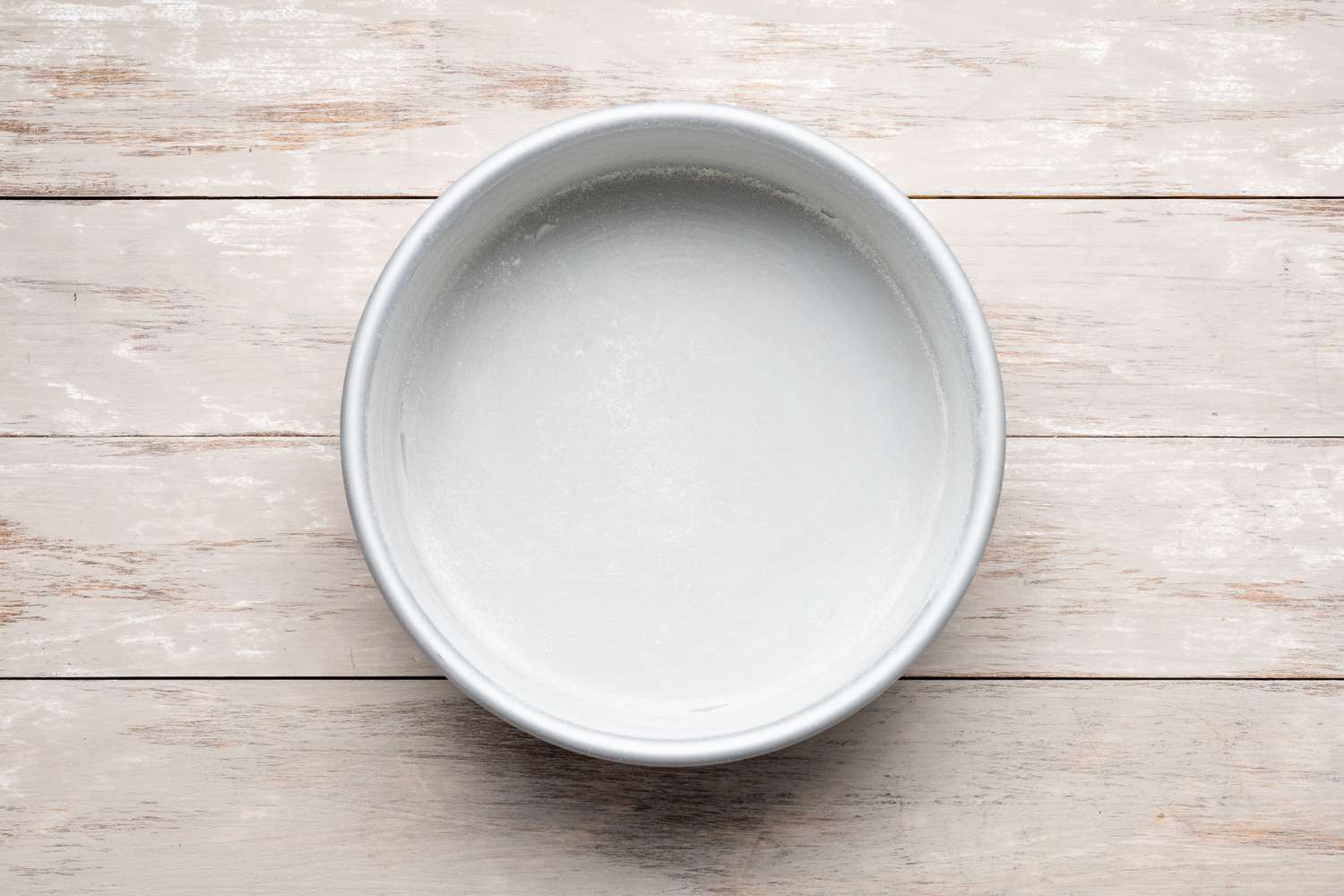 A Buttered Circular Cake Pan for Strawberry Shortcake Cake Recipe